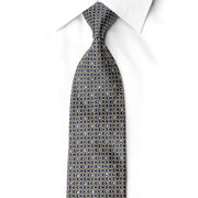 San-Dee rhinestone silk necktie DH216 — close-up of navy geometric lattice with crystal rhinestones and gold sparkles, showing gold monogram embroidery at blade tip