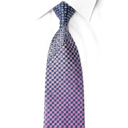 San-Dee pink navy rhinestone silk necktie worn on white shirt, showing gradient checkerboard pattern with crystal sparkles and baroque scroll detail near the knot