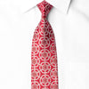 San-Dee red silk rhinestone necktie with ivory silver medallion floral pattern and crystal sparkles worn on white dress shirt showing full knot