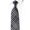San-Dee black silk diamond grid rhinestone necktie worn on white dress shirt – front view showing iridescent AB crystal rhinestone pattern