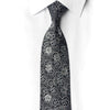 San-Dee black floral rhinestone silk necktie laid flat on white fabric, showing intricate silver sparkle crystal detail