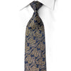 San-Dee navy silk rhinestone necktie with gold paisley jacquard pattern and crystal rhinestone accents, laid flat on white dress shirt