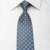 Renoma Men’s Woven Silk Necktie Silver Cartouche On Blue 